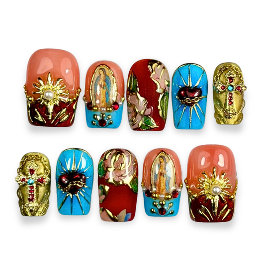10-piece Catholic Roman press-on nail set featuring red, black, and gold tones with 3D crucifix charms, ornate baroque jewels, and a gothic luxury finish.