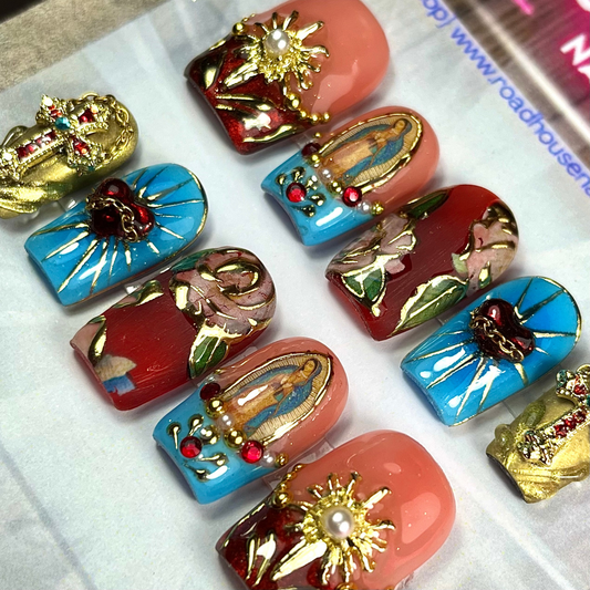 10-piece Catholic Roman press-on nail set featuring red, black, and gold tones with 3D crucifix charms, ornate baroque jewels, and a gothic luxury finish.